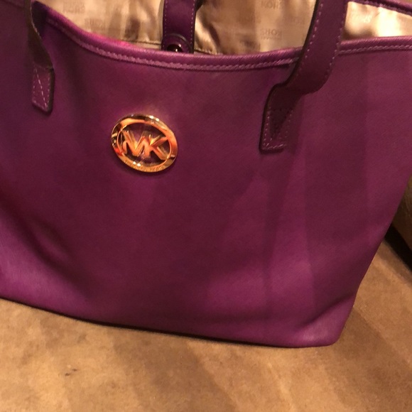 Michael Kors Handbags - Michael Kors large tote bag, 18” across X 4” wide x 11” High.  purple